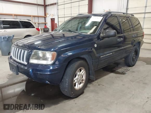 ✅ 2004 Jeep Grand Cherokee Laredo • VIN: 1J4GW48N34C323803 • Lot: 43519623. Listed on IAAI with 179,258 mi. Free auction sales archive from the USA and detailed vehicle history report at DreamBid. Image 2.