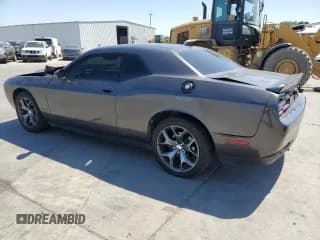 ✅ 2016 Dodge Challenger SXT Plus • VIN: 2C3CDZAG1GH329687 • Lot: 56808653. Wystawiony na Copart z przebiegiem 97 197 mil. Bezpłatny archiwum sprzedaży aukcyjnych z USA i szczegółowy raport historii pojazdu na DreamBid. Zdjęcie 2.