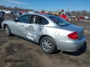 ✅ 2009 Buick LaCrosse CX • VIN: 2G4WC582091148814 • Lot: 41595101. Listed on IAAI with 135,845 mi. Free auction sales archive from the USA and detailed vehicle history report at DreamBid. Image 3.