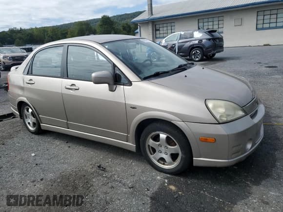 ✅ 2004 Suzuki Aerio S • VIN: JS2RA61S545201835 • Lot: 80082825. Wystawiony na Copart z przebiegiem 147 129 mil. Bezpłatny archiwum sprzedaży aukcyjnych z USA i szczegółowy raport historii pojazdu na DreamBid. Zdjęcie 4.