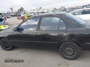✅ 1995 Toyota Corolla DX • VIN: JT2AE09B2S0099832 • Lot: 43747516. Wystawiony na IAAI z przebiegiem 198 942 mil. Bezpłatny archiwum sprzedaży aukcyjnych z USA i szczegółowy raport historii pojazdu na DreamBid. Zdjęcie 14.