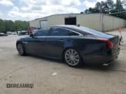 ✅ 2015 Jaguar XJ • VIN: SAJWJ1CD9F8V83885 • Lot: 58016335. Listed on Copart with 81,794 mi. Free auction sales archive from the USA and detailed vehicle history report at DreamBid. Image 2.