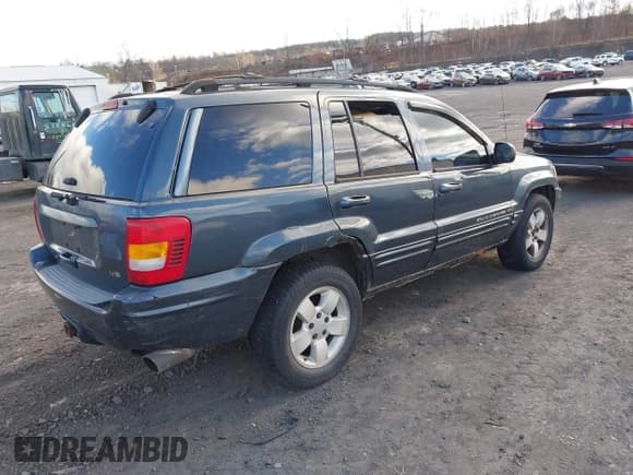 ✅ 2001 Jeep Grand Cherokee Limited • VIN: 1J4GW58N61C545463 • Lot: 43827998. Listed on IAAI with 221,239 mi. Free auction sales archive from the USA and detailed vehicle history report at DreamBid. Image 4.