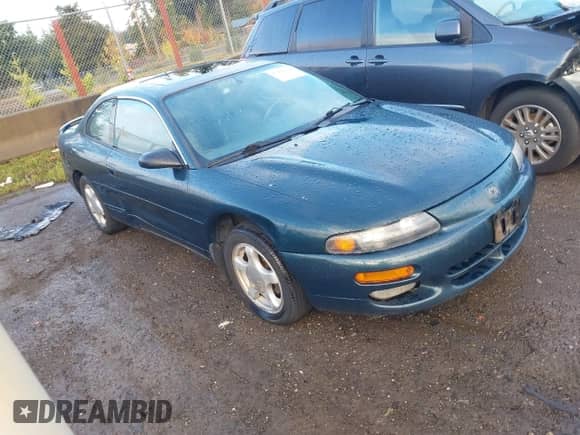 1995 Dodge Avenger z VIN 4B3AU52N9SE215767, wystawiony jako IAAI lot #43494144 z przebiegiem 217 304 mil mil oraz . Historia ofert i sprzedaży dostępna na DreamBid. Obrazek 1.