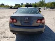 ✅ 2009 Volkswagen Jetta SE • VIN: 3VWRZ71KX9M085572 • Lot: 56634345. Listed on Copart with 184,504 mi. Free auction sales archive from the USA and detailed vehicle history report at DreamBid. Image 6.