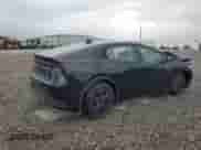 2025 Toyota Prius LE с VIN JTDACAAUXS3049419, выставлен на аукционе Copart как лот 81306805 с пробегом 17 985 миль миль и Списание • Salvage title. История ставок и продаж доступна на DreamBid. Изображение 3.