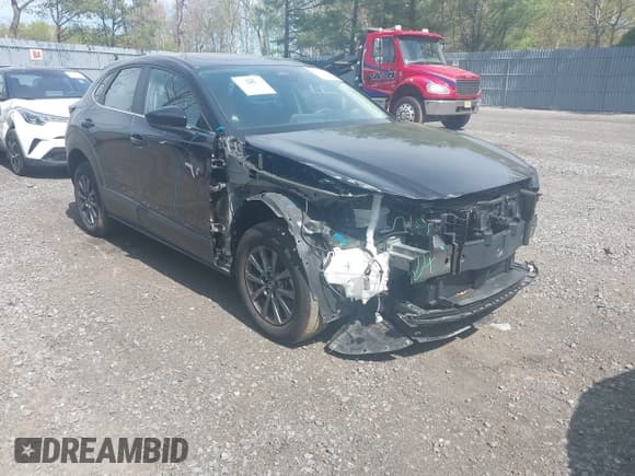 ✅ 2024 Mazda CX-30 S • VIN: 3MVDMBAM2RM627522 • Lot: 42117647. Listed on IAAI with 9,935 mi. Free auction sales archive from the USA and detailed vehicle history report at DreamBid. Image 1.