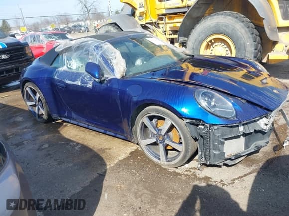 ✅ 2022 Porsche 911 Carrera • VIN: WP0CA2A96NS236957 • Lot: 41154002. Listed on IAAI with 34,056 mi. Free auction sales archive from the USA and detailed vehicle history report at DreamBid. Image 1.