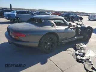 ✅ 2002 Dodge Viper RT/10 • VIN: 1B3ER65E02V102232 • Lot: 84650754. Listed on Copart with 16,100 mi. Free auction sales archive from the USA and detailed vehicle history report at DreamBid. Image 3.