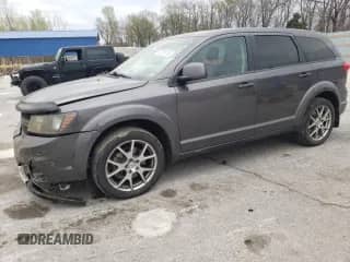 2015 Dodge Journey R/T with VIN 3C4PDDEG9FT749584, listed as a Copart auction lot 66297275 with 150,483 mi miles and Salvage title. Bid and sale history available at DreamBid. Image 1.