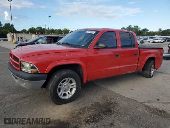 2003 Dodge Dakota SLT с VIN 1D7HG48NX3S345590, выставлен на аукционе Copart как лот 70002875 с пробегом 437 659 миль миль и Чистый • Clean title. История ставок и продаж доступна на DreamBid. Изображение 1.