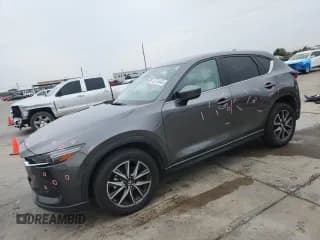 ✅ 2018 Mazda CX-5 Grand Touring • VIN: JM3KFADM7J1466330 • Lot: 82735445. Listed on Copart with 82,891 mi. Free auction sales archive from the USA and detailed vehicle history report at DreamBid. Image 1.