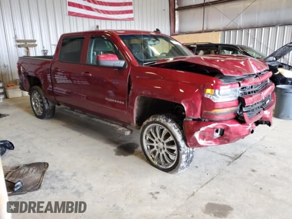 ✅ 2018 Chevrolet Silverado 1500 LT • VIN: 3GCUKREC4JG487834 • Lot: 82659325. Wystawiony na Copart z przebiegiem 91 297 mil. Bezpłatny archiwum sprzedaży aukcyjnych z USA i szczegółowy raport historii pojazdu na DreamBid. Zdjęcie 4.
