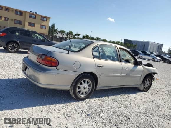 1997 Chevrolet Malibu LS z VIN 1G1NE52M0V6116879, wystawiony jako Copart lot #57306115 z przebiegiem Nie podano mil oraz Szkoda całkowita • Salvage title. Historia ofert i sprzedaży dostępna na DreamBid. Obrazek 3.