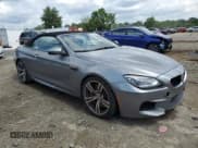 ✅ 2014 BMW M6 • VIN: WBSLZ9C59EDZ78374 • Lot: 64514265. Listed on Copart with 116,864 mi. Free auction sales archive from the USA and detailed vehicle history report at DreamBid. Image 4.