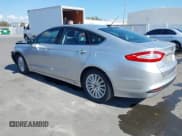 ✅ 2013 Ford Fusion SE Hybrid • VIN: 3FA6P0LU8DR262977 • Lot: 43729571. Listed on IAAI with 115,875 mi. Free auction sales archive from the USA and detailed vehicle history report at DreamBid. Image 3.