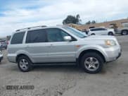 ✅ 2006 Honda Pilot EX-L • VIN: 2HKYF18566H558647 • Lot: 43633483. Listed on IAAI with 203,447 mi. Free auction sales archive from the USA and detailed vehicle history report at DreamBid. Image 14.