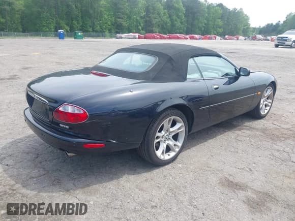 ✅ 2003 Jaguar XK • VIN: SAJDA42C732A35547 • Lot: 42090286. Listed on IAAI with 65,840 mi. Free auction sales archive from the USA and detailed vehicle history report at DreamBid. Image 4.