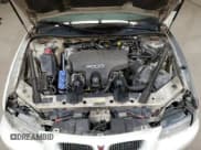 ✅ 2002 Pontiac Grand Prix GT • VIN: 1G2WP12K52F262028 • Лот: 70868895. Опубликован ранее на Copart с пробегом 323 648 миль. Бесплатный доступ к архиву аукционных продаж из США и подробный отчёт об истории автомобиля на DreamBid. Изображение 11.