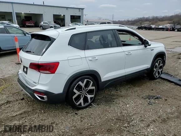 ✅ 2023 Volkswagen Taos SEL • VIN: 3VV2X7B29PM334788 • Lot: 51827675. Listed on Copart with 18,460 mi. Free auction sales archive from the USA and detailed vehicle history report at DreamBid. Image 14.