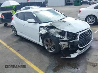 ✅ 2013 Hyundai Veloster Turbo • VIN: KMHTC6AE6DU112233 • Lot: 41869164. Listed on IAAI with 151,091 mi. Free auction sales archive from the USA and detailed vehicle history report at DreamBid. Image 1.