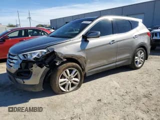 ✅ 2015 Hyundai Santa Fe • VIN: 5XYZW4LA0FG252772 • Лот: 38169243. Опубликован ранее на Copart с пробегом 53 507 миль. Бесплатный доступ к архиву аукционных продаж из США и подробный отчёт об истории автомобиля на DreamBid. Изображение 1.