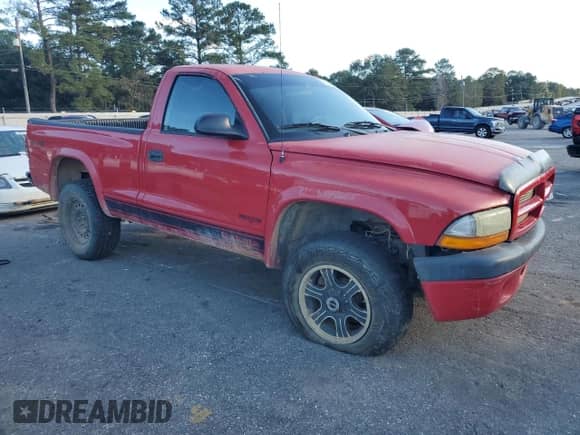 2003 Dodge Dakota with VIN 1D7GG16X73S202269, listed as a Copart auction lot 81954304 with Not provided miles and Salvage title. Bid and sale history available at DreamBid. Image 4.