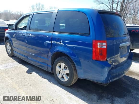 2010 Dodge Grand Caravan SE with VIN 2D4RN4DE7AR296991, listed as a IAAI auction lot 41652582 with 122,884 mi miles and . Bid and sale history available at DreamBid. Image 3.