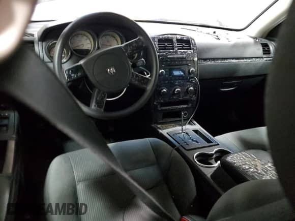 2009 Dodge Charger SXT с VIN 2B3KA33V89H627232, выставлен на аукционе Copart как лот 80537144 с пробегом 259 502 миль миль и Списание • Salvage title. История ставок и продаж доступна на DreamBid. Изображение 8.