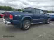 2004 Dodge Dakota SLT z VIN 1D7HG48N94S688652, wystawiony jako Copart lot #71942564 z przebiegiem 141 942 mil mil oraz Szkoda całkowita • Salvage title. Historia ofert i sprzedaży dostępna na DreamBid. Obrazek 3.