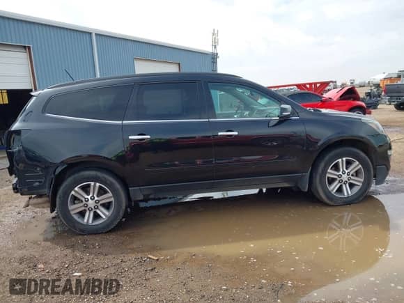 2015 Chevrolet Traverse LT z VIN 1GNKVHKDXFJ112775, wystawiony jako IAAI lot #43396691 z przebiegiem Nie podano mil oraz . Historia ofert i sprzedaży dostępna na DreamBid. Obrazek 14.
