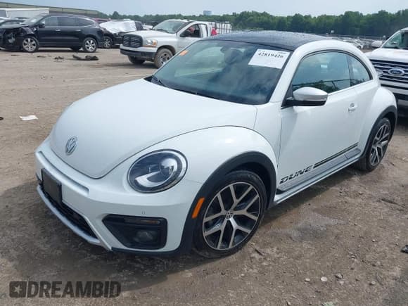 ✅ 2016 Volkswagen Beetle Dune • VIN: 3VWS17AT9GM630045 • Лот: 42819426. Опубликован ранее на IAAI с пробегом 30 370 миль. Бесплатный доступ к архиву аукционных продаж из США и подробный отчёт об истории автомобиля на DreamBid. Изображение 17.