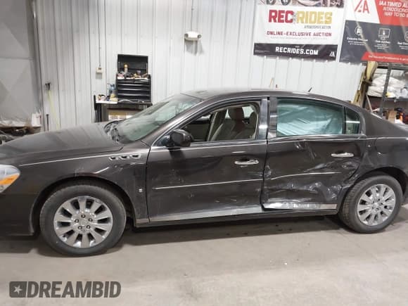 ✅ 2008 Buick Lucerne CXL • VIN: 1G4HD57278U191007 • Lot: 43608950. Wystawiony na IAAI z przebiegiem 94 245 mil. Bezpłatny archiwum sprzedaży aukcyjnych z USA i szczegółowy raport historii pojazdu na DreamBid. Zdjęcie 14.