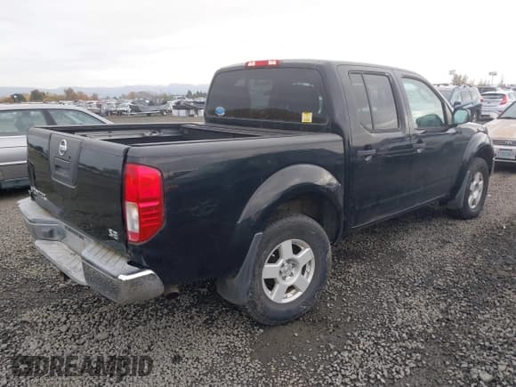 ✅ 2005 Nissan Frontier Nismo • VIN: 1N6AD07W55C411044 • Lot: 43599846. Listed on IAAI with 128,957 mi. Free auction sales archive from the USA and detailed vehicle history report at DreamBid. Image 4.