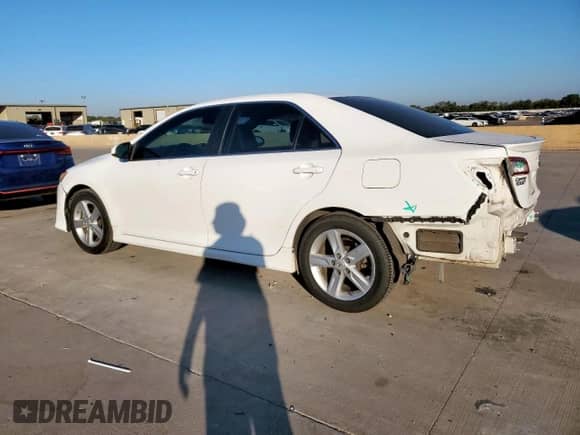 2014 Toyota Camry L with VIN 4T1BF1FK4EU744573, listed as a Copart auction lot 82307495 with 124,046 mi miles and Salvage title. Bid and sale history available at DreamBid. Image 2.