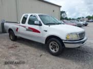 ✅ 1997 Ford F-150 XL • VIN: 1FTEX17L3VNB22949 • Lot: 42377443. Listed on IAAI with 119,148 mi. Free auction sales archive from the USA and detailed vehicle history report at DreamBid. Image 1.