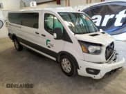 ✅ 2024 Ford Transit Passenger XL • VIN: 1FBAX2Y89RKA86131 • Lot: 54841145. Listed on Copart with 14,890 mi. Free auction sales archive from the USA and detailed vehicle history report at DreamBid. Image 4.