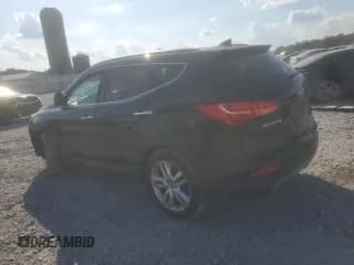 ✅ 2013 Hyundai Santa Fe Sport • VIN: 5XYZU3LA5DG034727 • Лот: 81602545. Опубликован ранее на Copart с пробегом 99 112 миль. Бесплатный доступ к архиву аукционных продаж из США и подробный отчёт об истории автомобиля на DreamBid. Изображение 2.