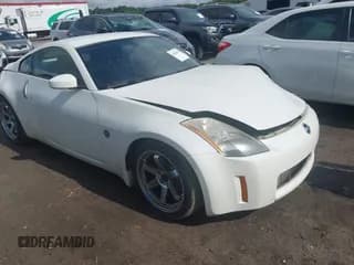 ✅ 2003 Nissan 350Z Touring • VIN: JN1AZ34E23T011900 • Lot: 42446339. Wystawiony na IAAI z przebiegiem 134 471 mil. Bezpłatny archiwum sprzedaży aukcyjnych z USA i szczegółowy raport historii pojazdu na DreamBid. Zdjęcie 1.