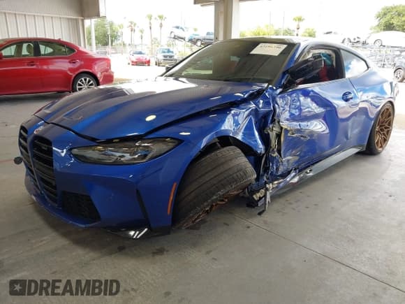 ✅ 2023 BMW M4 Competition • VIN: WBS33AZ04PCL88204 • Lot: 43186396. Listed on IAAI with 33,258 mi. Free auction sales archive from the USA and detailed vehicle history report at DreamBid. Image 2.