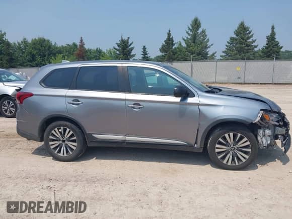 2019 Mitsubishi Outlander ES z VIN JA4AD2A35KZ055131, wystawiony jako IAAI lot #42877312 z przebiegiem 205 498 mil mil oraz . Historia ofert i sprzedaży dostępna na DreamBid. Obrazek 13.