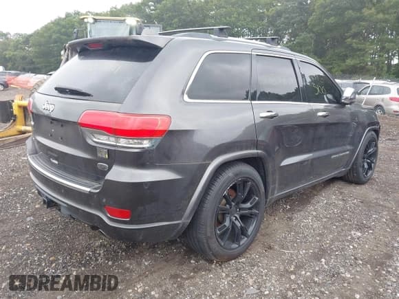 ✅ 2014 Jeep Grand Cherokee Overland • VIN: 1C4RJFCT5EC137468 • Lot: 43254198. Listed on IAAI with Not provided. Free auction sales archive from the USA and detailed vehicle history report at DreamBid. Image 4.