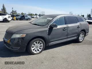 ✅ 2015 Lincoln MKT • VIN: 2LMHJ5NK0FBL00152 • Лот: 65801565. Опубликован ранее на Copart с пробегом 118 120 миль. Бесплатный доступ к архиву аукционных продаж из США и подробный отчёт об истории автомобиля на DreamBid. Изображение 1.