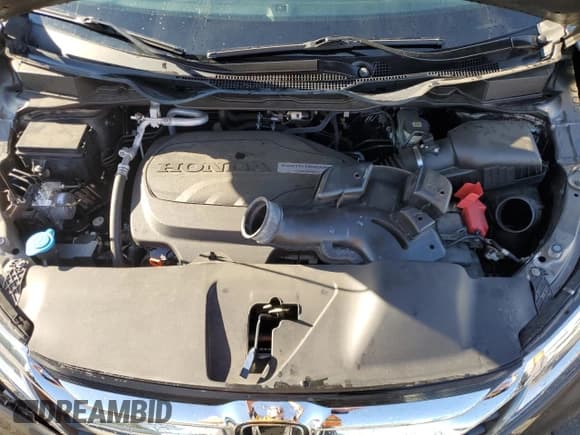 ✅ 2018 Honda Odyssey Elite • VIN: 5FNRL6H98JB097214 • Lot: 87065895. Listed on Copart with 115,569 mi. Free auction sales archive from the USA and detailed vehicle history report at DreamBid. Image 12.