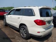 ✅ 2013 Mercedes-Benz GL 350 • VIN: 4JGDF2EE9DA082077 • Lot: 42451504. Listed on IAAI with 113,424 mi. Free auction sales archive from the USA and detailed vehicle history report at DreamBid. Image 3.