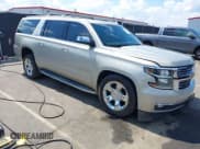 ✅ 2015 Chevrolet Suburban LTZ • VIN: 1GNSKKKC2FR509864 • Lot: 43233537. Wystawiony na IAAI z przebiegiem 241 210 mil. Bezpłatny archiwum sprzedaży aukcyjnych z USA i szczegółowy raport historii pojazdu na DreamBid. Zdjęcie 1.