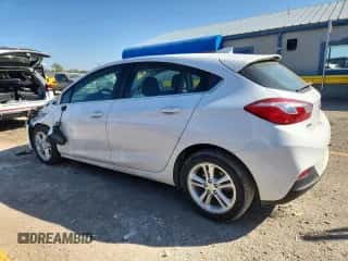 2018 Chevrolet Cruze LT с VIN 3G1BE6SM1JS654487, выставлен на аукционе Copart как лот 84282045 с пробегом 77 071 миль миль и Списание • Salvage title. История ставок и продаж доступна на DreamBid. Изображение 2.