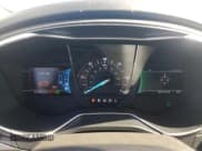 ✅ 2016 Ford Fusion Titanium Hybrid • VIN: 3FA6P0RU3GR127210 • Lot: 82348345. Wystawiony na Copart z przebiegiem 87 833 mil. Bezpłatny archiwum sprzedaży aukcyjnych z USA i szczegółowy raport historii pojazdu na DreamBid. Zdjęcie 9.