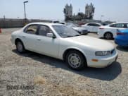 ✅ 1997 Infiniti J30 Personal Luxury • VIN: JNKAY21D8VM505180 • Lot: 64307265. Listed on Copart with 180,825 mi. Free auction sales archive from the USA and detailed vehicle history report at DreamBid. Image 4.