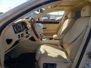 ✅ 2014 Bentley Flying Spur • VIN: SCBEC9ZAXEC095785 • Lot: 46089425. Listed on Copart with 23,435 mi. Free auction sales archive from the USA and detailed vehicle history report at DreamBid. Image 7.